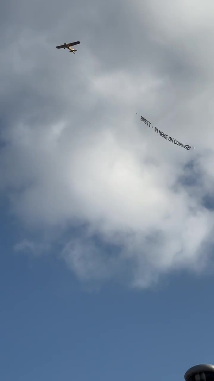 Crypto aerial banner plane advertising over Amsterdam
